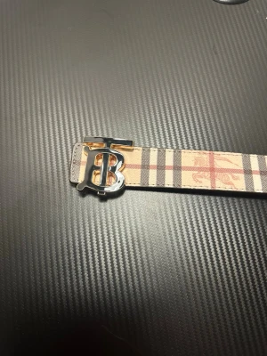 Tb bälte - 110cm, helt ny och skickas med skydd+metall som man kan göra extra hål med