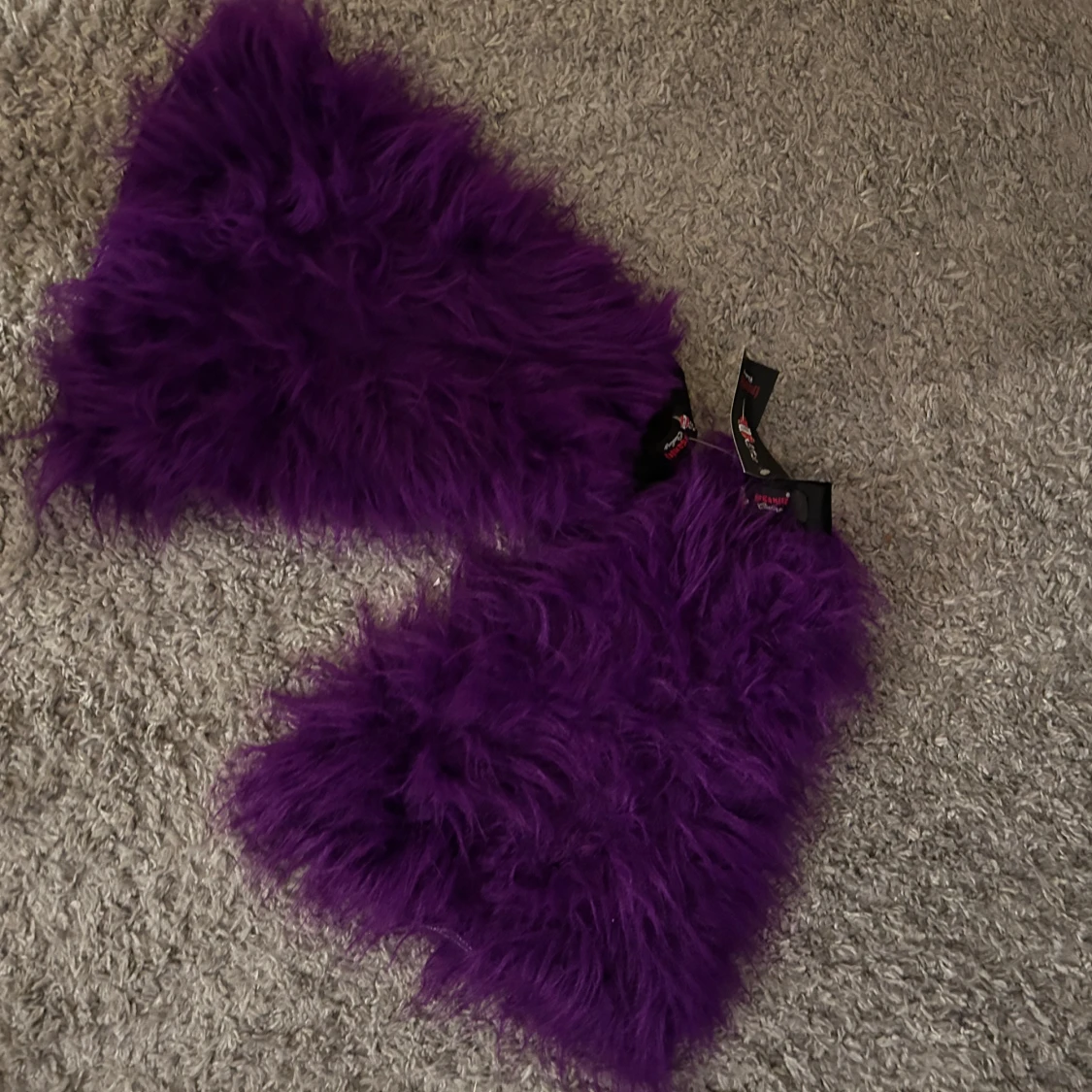 Lila fluffiga benvärmare