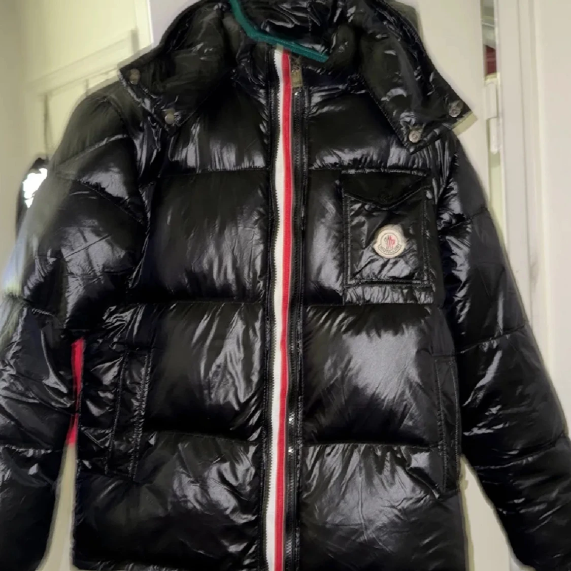 Svart Moncler pufferjacka M
