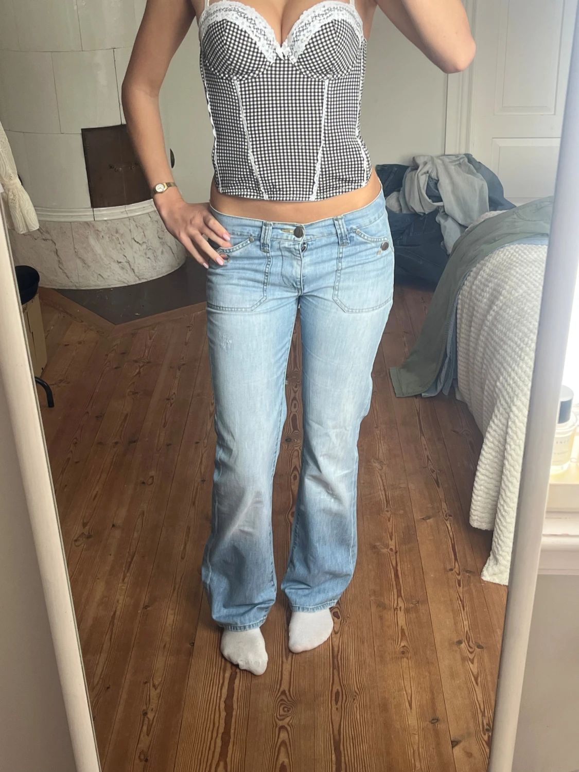 Ljusblå bootcut jeans vintage lågmidjade 