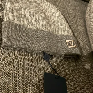 Beige och brun  mössa - Dm vid intresse 