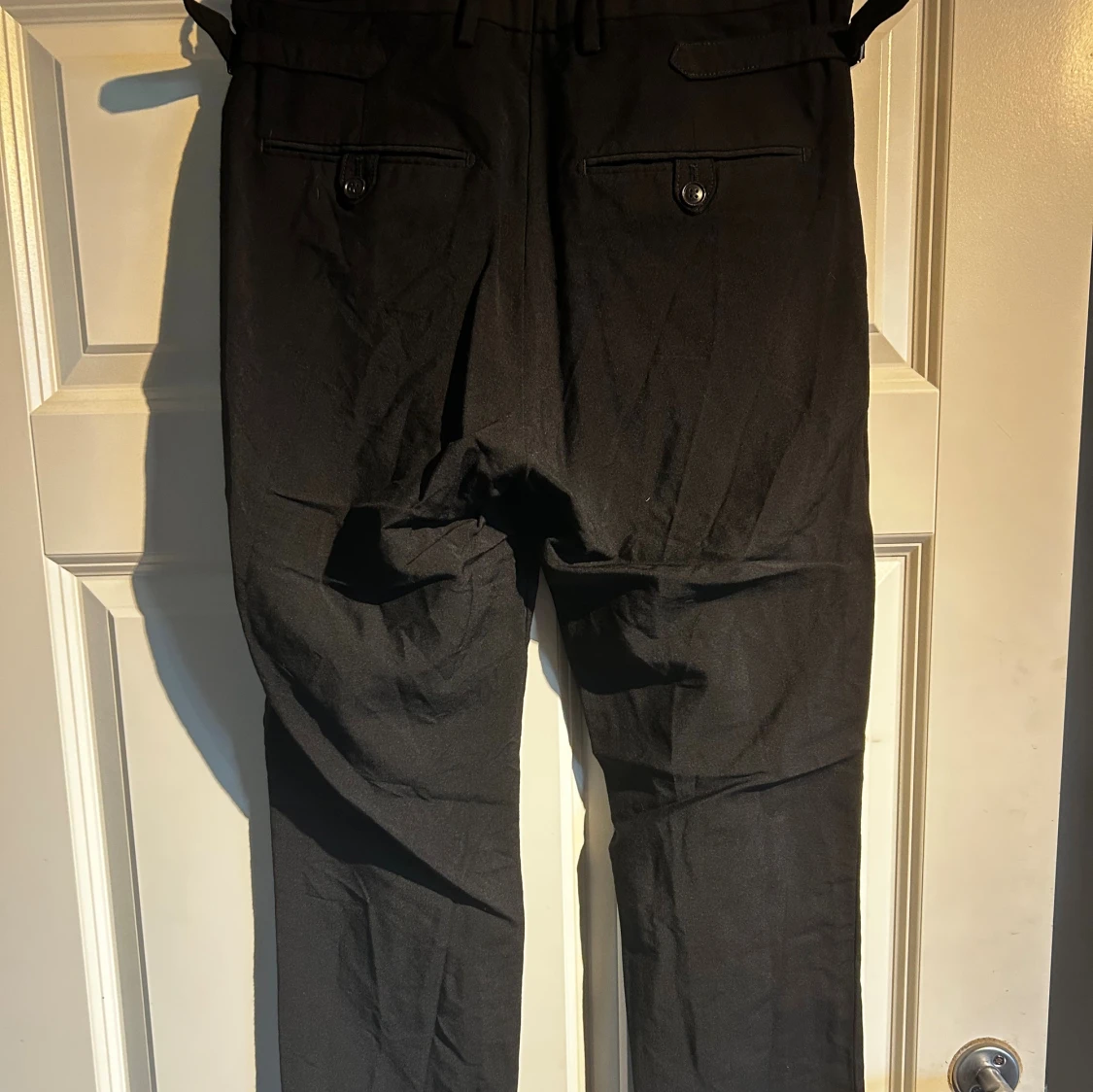 Svarta kostymbyxor med raka ben