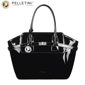 Vintage Svart lackad handväska från Pelletini - Vintage svart handväska från Pelletini i glansigt lackat skinn. Väskan är från ett tyskt märke- Pelletini och kom ut 1988 och säljs ej längre. Ej använd men har någon repa på samt skav på handtagen men det syns ej om man inte tittar noga på nära håll. I storlek så är den som en vanlig handväska alltså medium ungefär. Pris kan diskuteras. Skriv för mer bilder