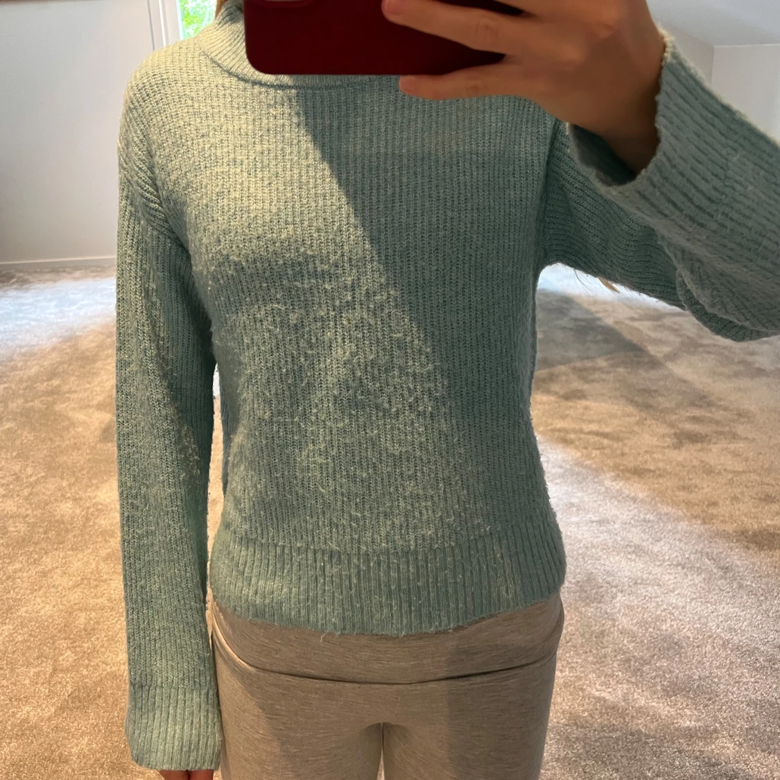 Ljusblå stickad tröja