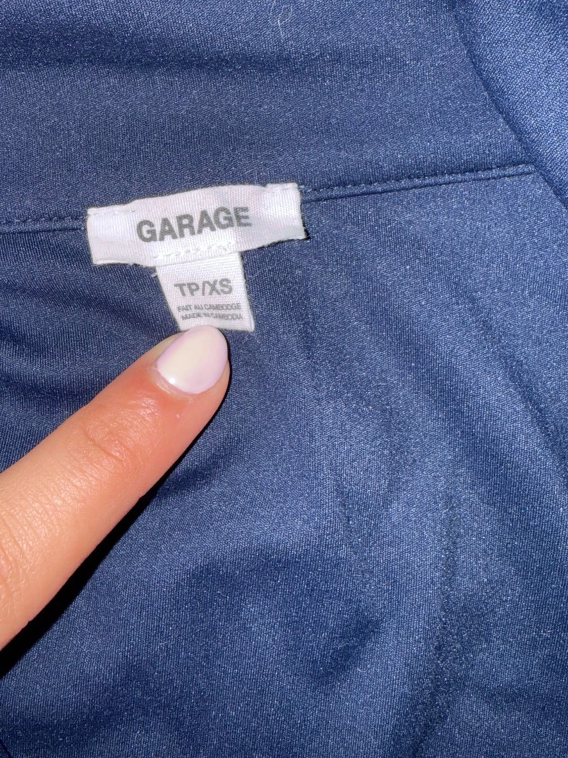 Mörkblå kortärmad polotopp Garage