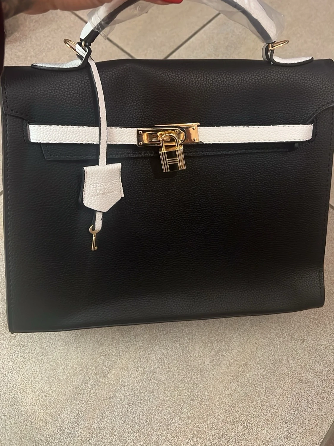 Brun quiltad handväska med nitar - 1