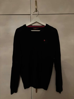 Svart stickad tröja från Morris - Riktigt bra skick, använd sällan.