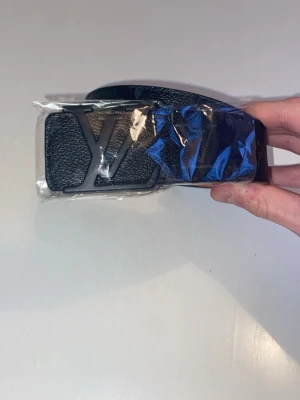 Svart LV bälte  - Riktigt bra kvalité, helt nytt, inga diffekter