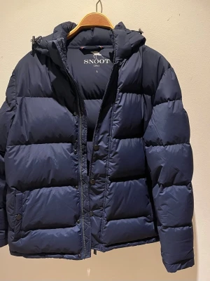 SNOOT Dunjacka - Damstorlek L. Endast använd 1 gång
