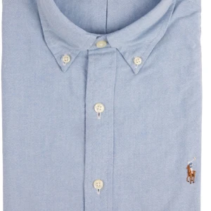 Ralph Lauren blå Skjorta - Slim fit, storlek m men kan även passa st.S