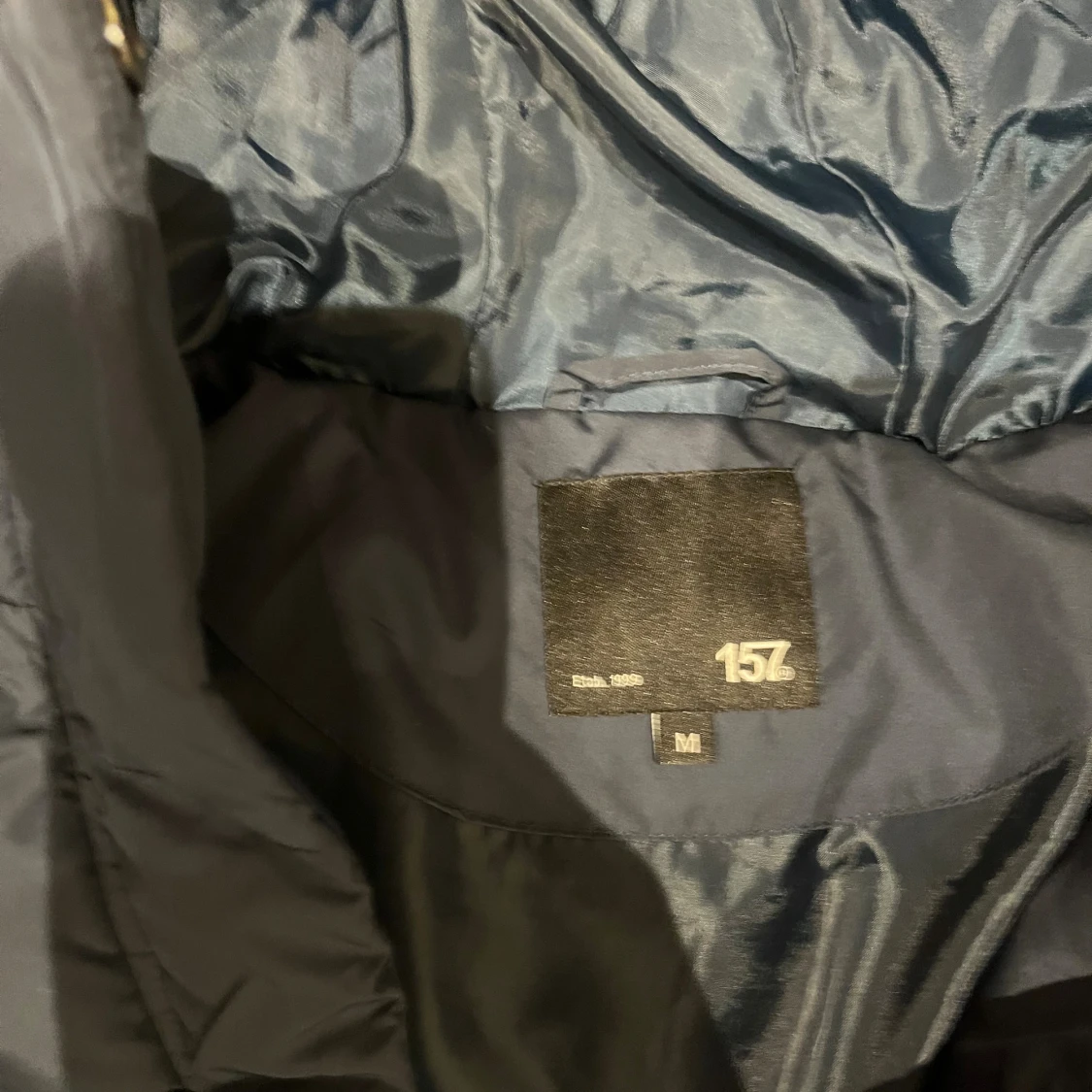 Mörkblå lång pufferjacka från 157 - 2