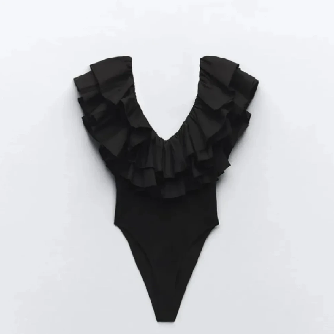 Svart Zara body med volanger