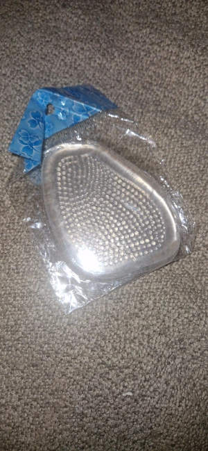 Gel-skoinläggsula  - 1 par silikongel eller liknande flexibelt material inläggssula som används för komfort, smärtlindring eller för att förbättra passformen i skor