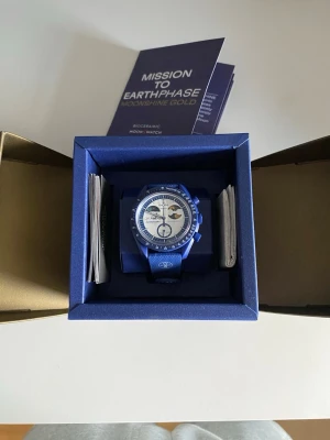 Omega X Swatch Moonshine Gold - Omega X Swatch Mission to Earthphase Moonshine Gold.