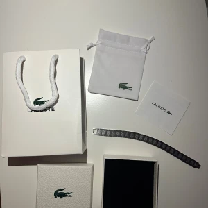 Lacoste armband  - Helt ny och du får allt