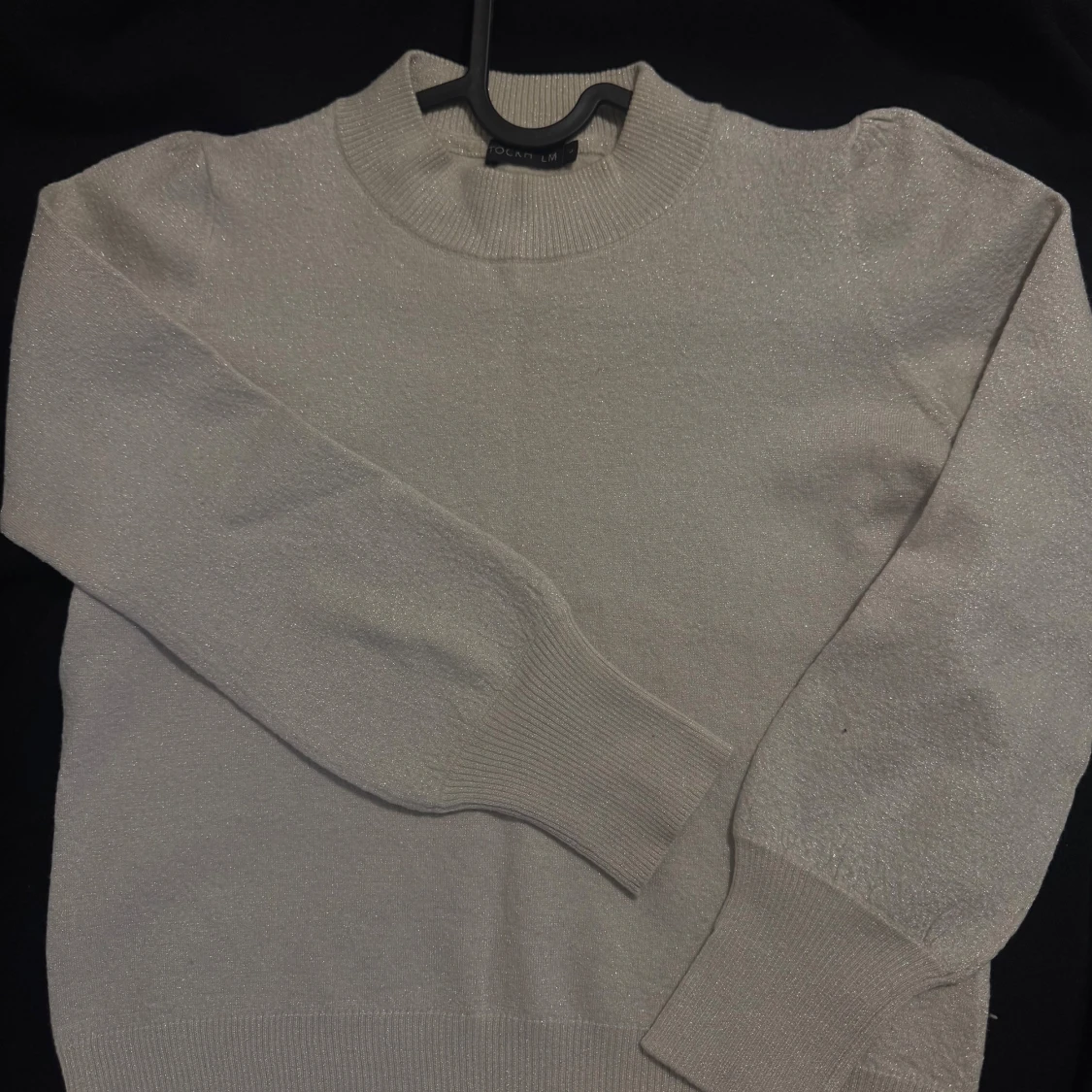 Glittrig beige/grå tröja från Stockholm 