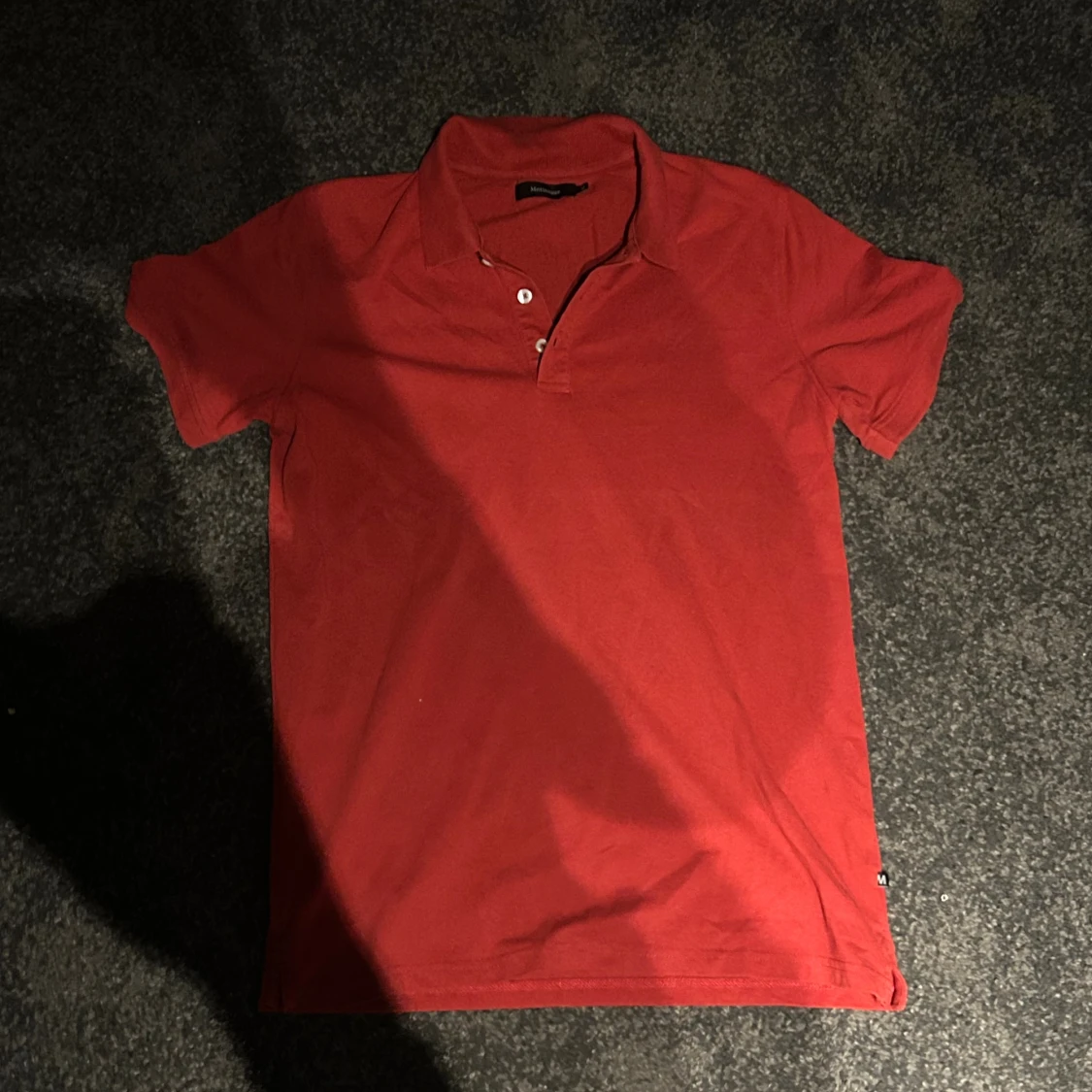 Röd pikétröja från Matinique