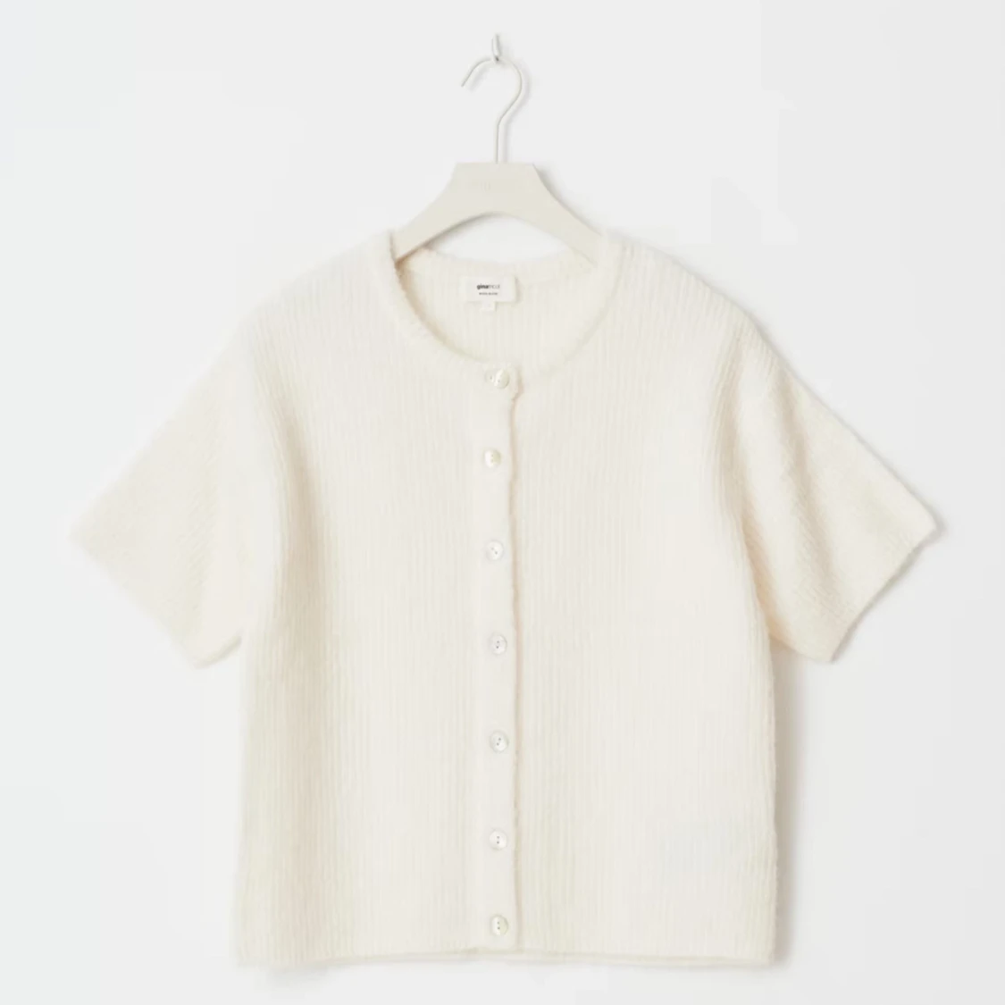 Vit kortärmad kofta från Gina Tricot