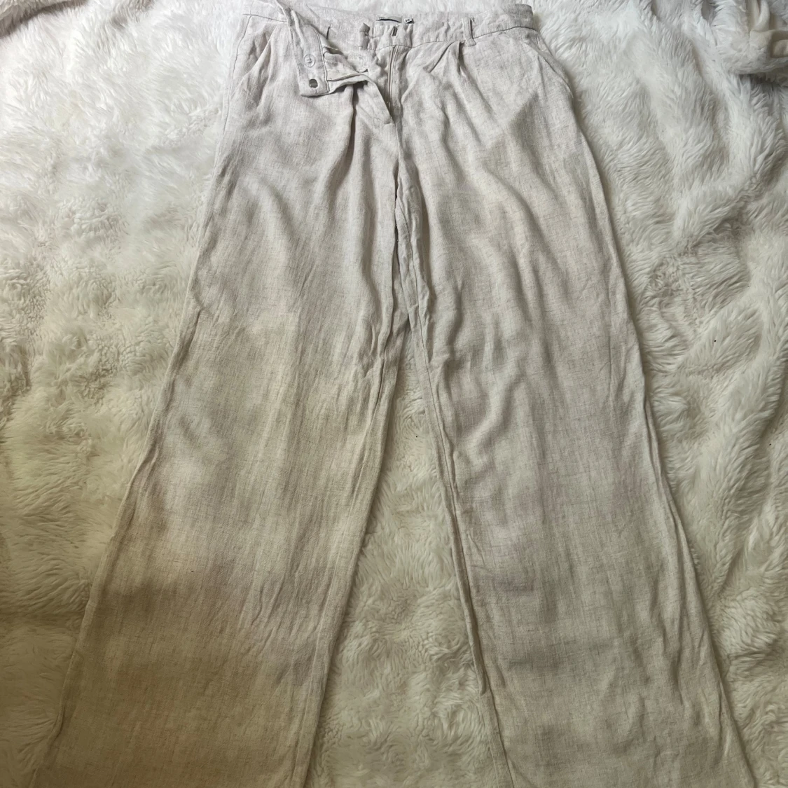 Beiga linnebyxor från Nelly strl 36 - 1