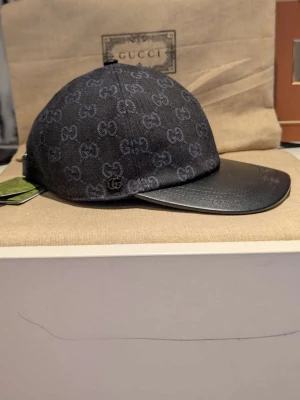 GG keps  - Helt ny GG denim keps storlek M 58cm, dustbag och tags medföljer 