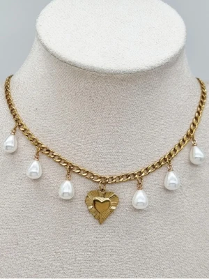 Handgjort halsband med hjärta  - Material-rostfritt stål.  Kedjetjocklek-4mm 