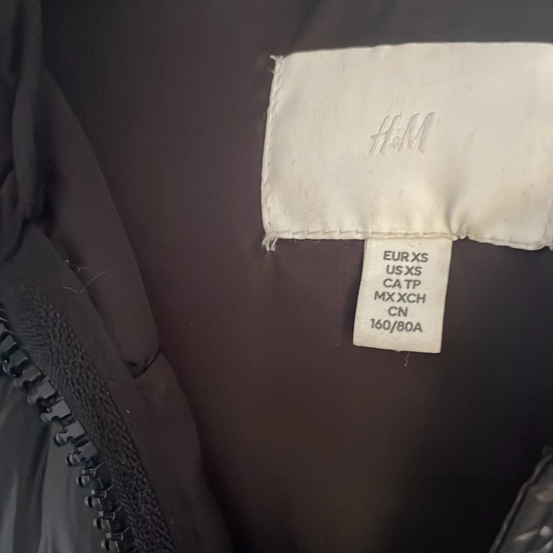 Svart glansig vinterjacka  - 91