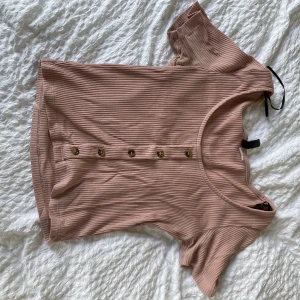 Söt rosa t-shirt  - En jätte söt t shirt från h&m som är i storlek S