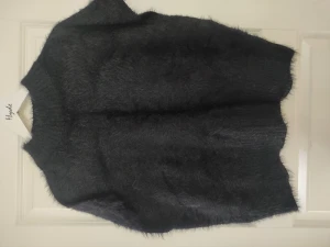 Väst från Gina  - Finns i Frölunda alt skickas  Bra använt skick (Hund och katt finns i hemmet)