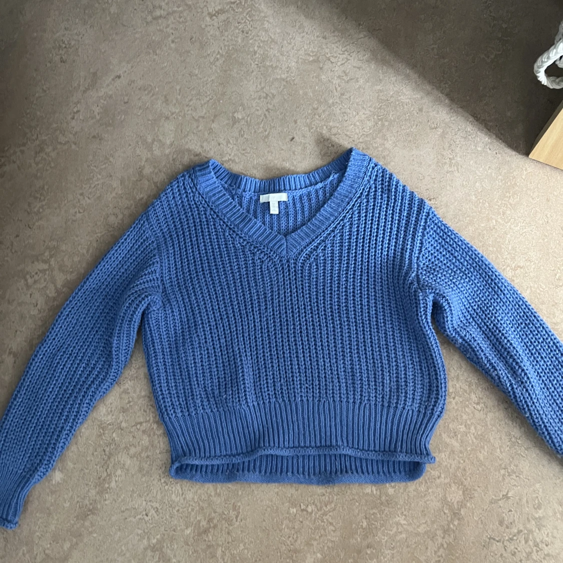 Blå stickad tröja