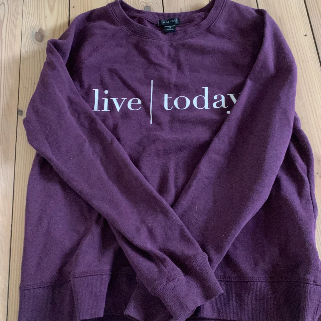 mörklila tjocktröja 