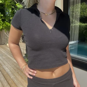 Träningströja - Svart träningstopp i storlek S.