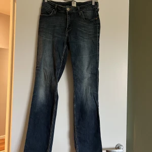Lee jeans  - Lågmidjade Lee Jeans. Storlek W29 L31