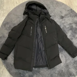 Sail racing jacka  - Sail racing jacka för barn Storlek 150 Köpt på kidsbrandstore Använd en vinter - inga skador  