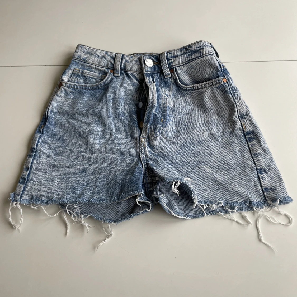 Högmidjade shorts