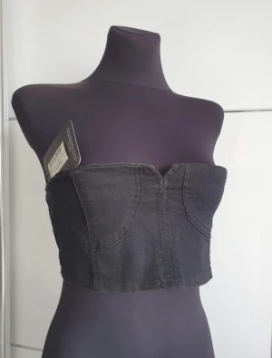 Denim Tube topp - Helt oanvänd med prislapp kvar. Svart denim. 