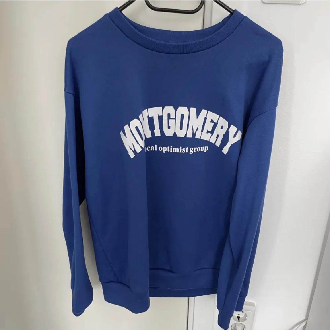 Blå sweatshirt