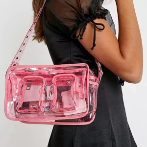 Nunoo väska - Supercool genomskinlig rosa väska från Nunoo. Använts ganska flitigt men inga defekter. Skickar såklart egna bilder vid efterfrågan. Originalpris 1500kr.