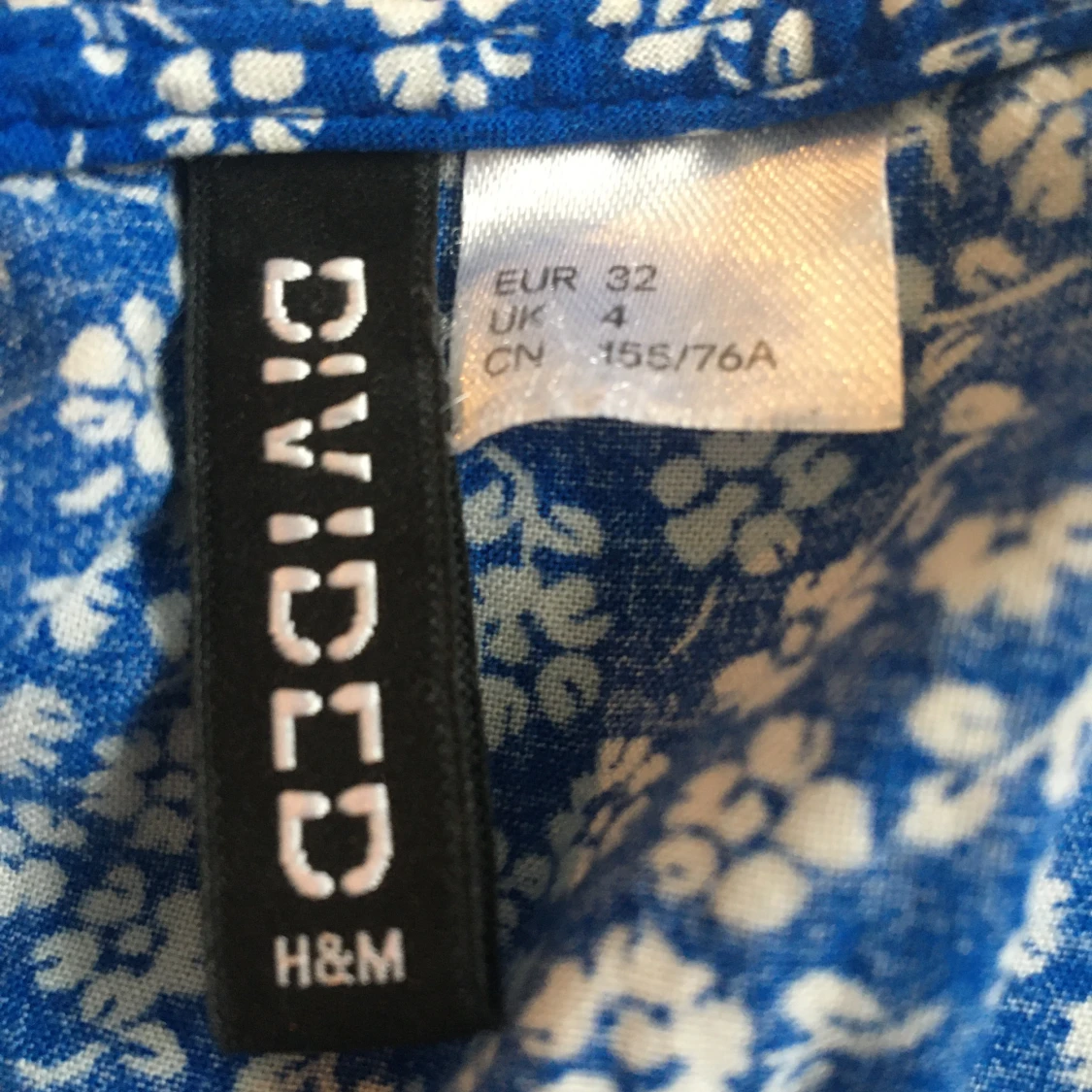 Blommig byxdress - 91