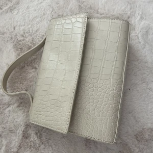 Garderob resning  - Liten handväska 