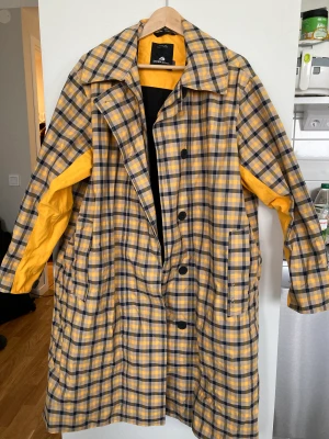 Regnrock Didriksson - Vattentät, använd en gång.