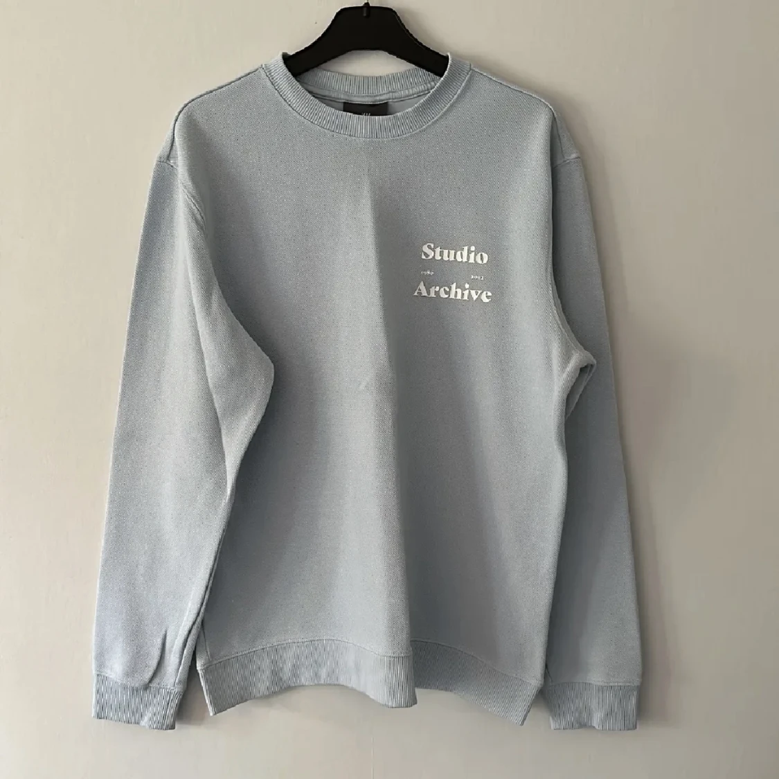 Ljusblå sweatshirt 