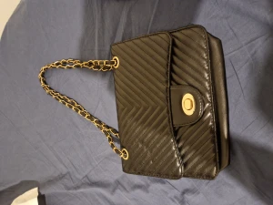 Handväska  - Mycet fint elegant har så många fickor.