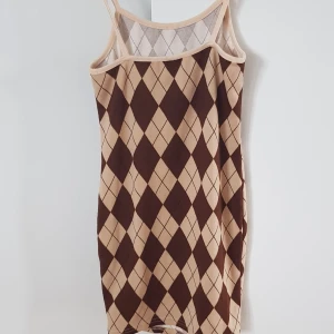 Klänning  - Kort klänning. Storlek 134.