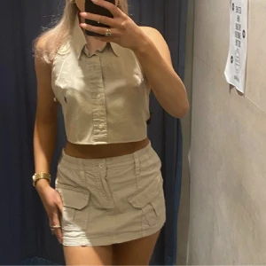 Ralph Lauren topp - Köpt från Urban Outfitters, passar storlek XS-S, knyts i ryggen. Helt ny. 