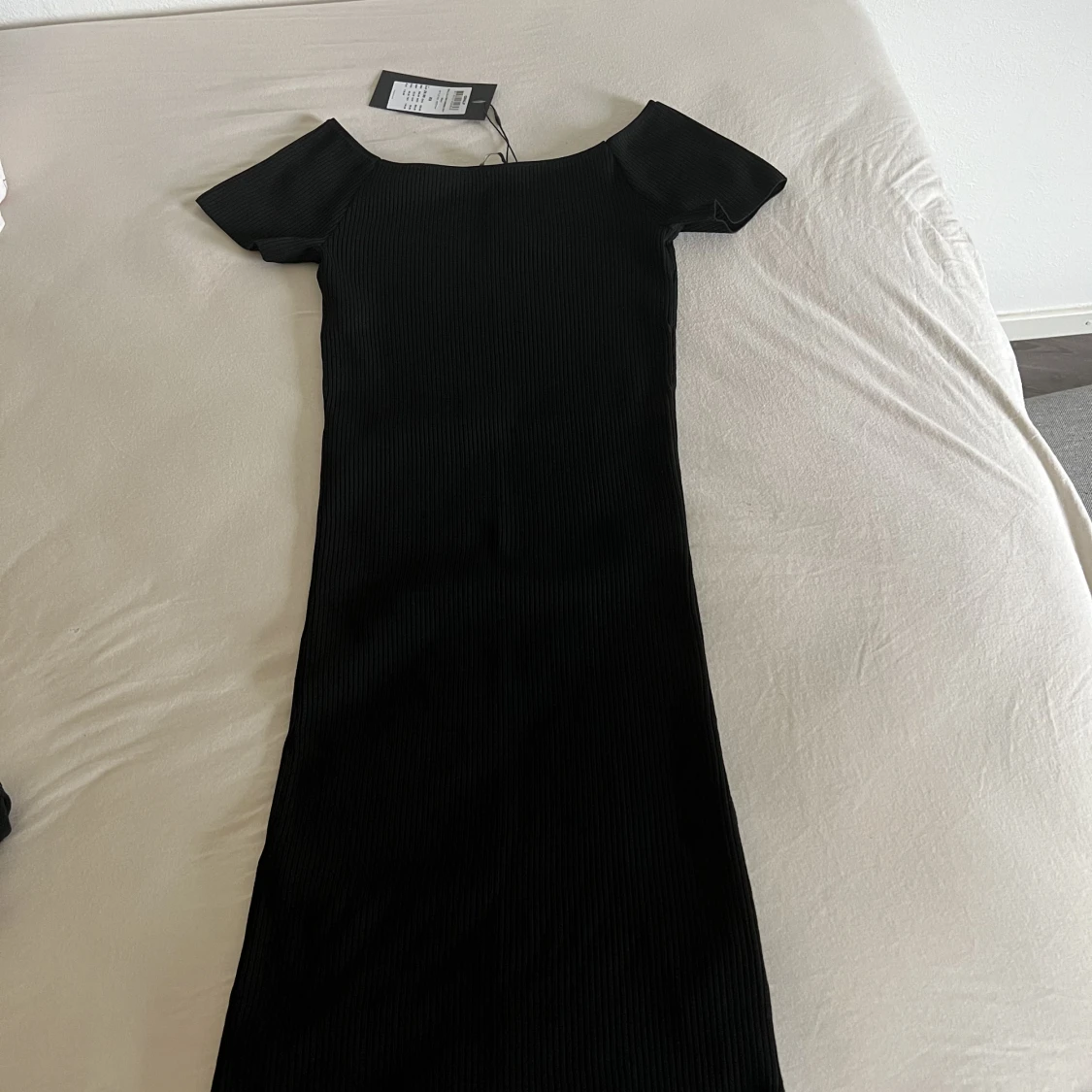 Helt ny ribbad klänning