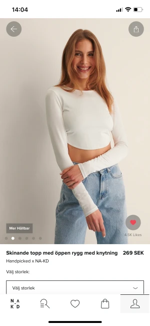 Topp med öppen rygg - Vit långärmad topp från nakd med öppen rygg. Aldrig använd och lappen sitter kvar. Är i storlek L men skulle säga att den sitter som en medium 