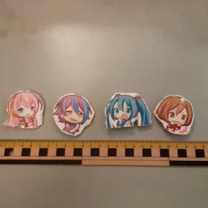 4st pjsk/vocaloid pins - 4st homemade pjsk/vocaloid pins Luka, rui, miku and meiko. Made with hot glue and tape so not super waterproof but can survive a few drops. There all super cute to use as a decoration to cosplays💕 Selling as a set or contact me!