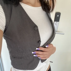 väst  - en mini väst köpt secondhand! 