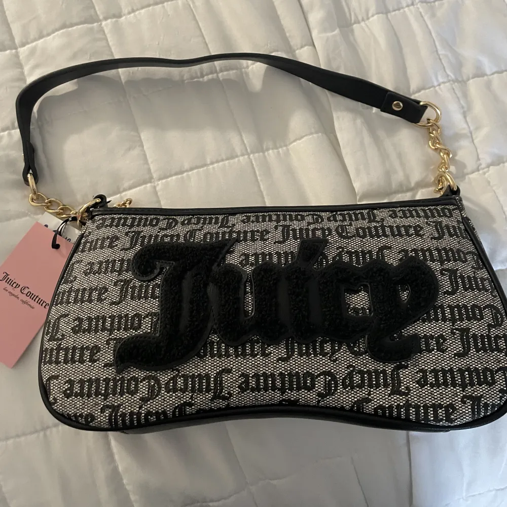 Helt ny. Snygg väska från juicy couture. . Asusteet.