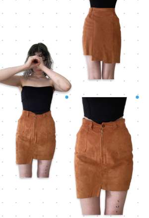 välgjord kjol i skinn orange/brun, bilderna gör den rättvisa assymetrisk, kängre på ena sidan